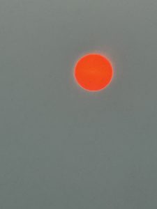 warm red vibrant sun in the sky